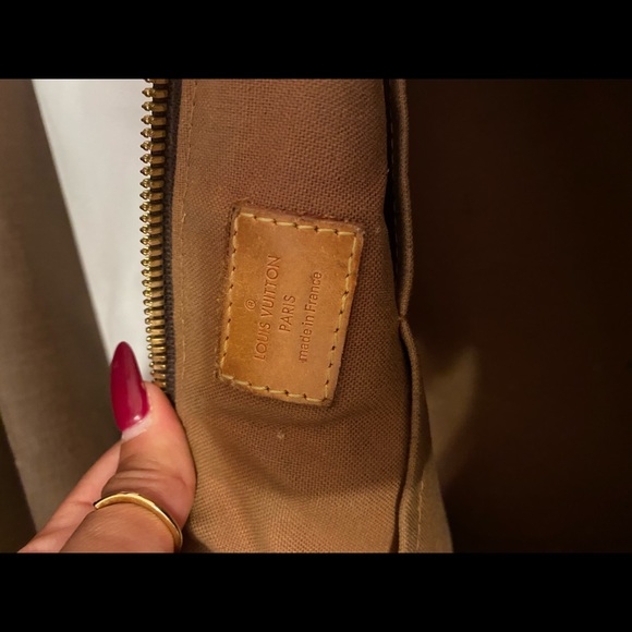 Louis Vuitton
Tivoli Handbag Monogram Canvas PM - Picture 12 of 16